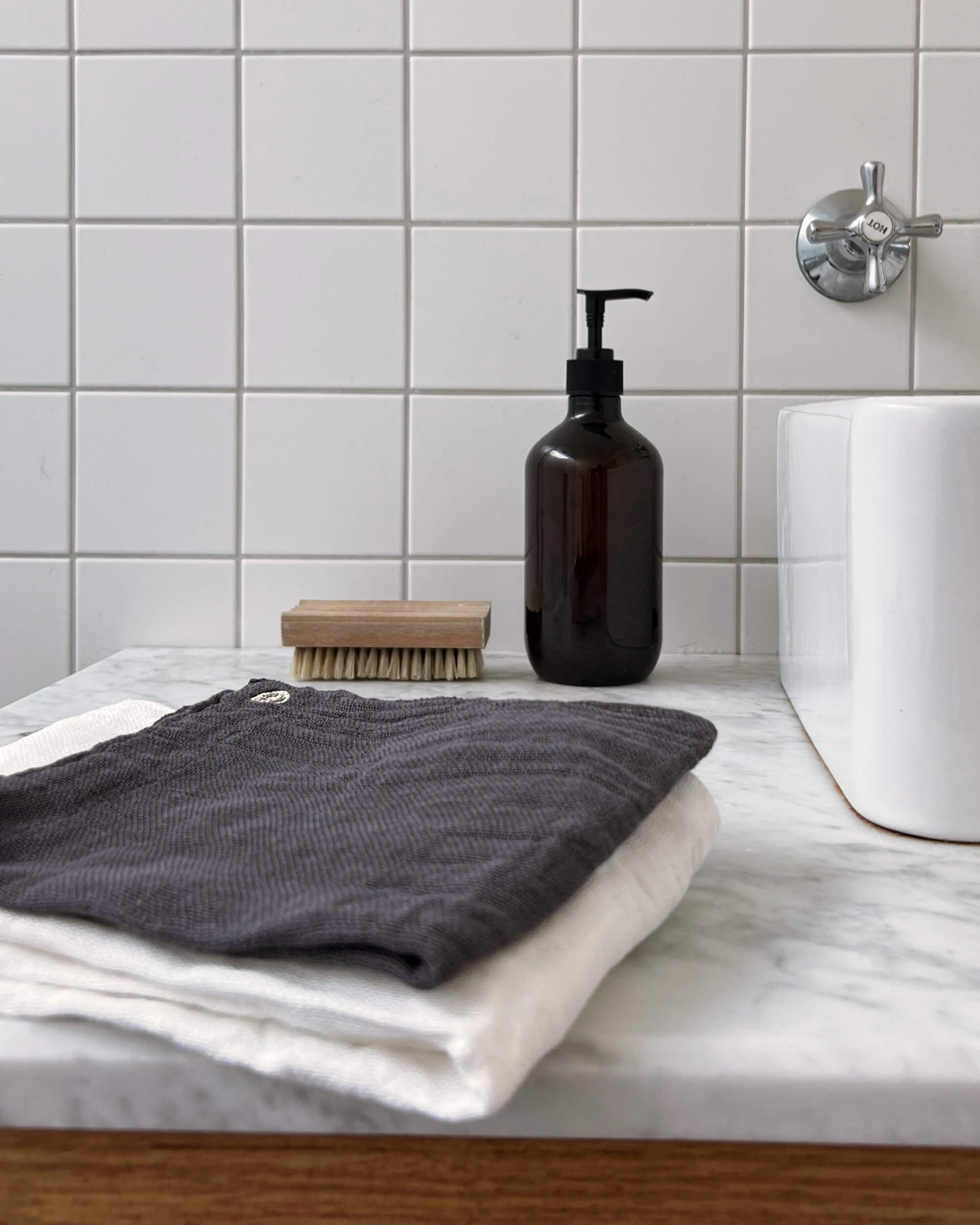 towels and wash cloths on display in bathroom | the maker hobart