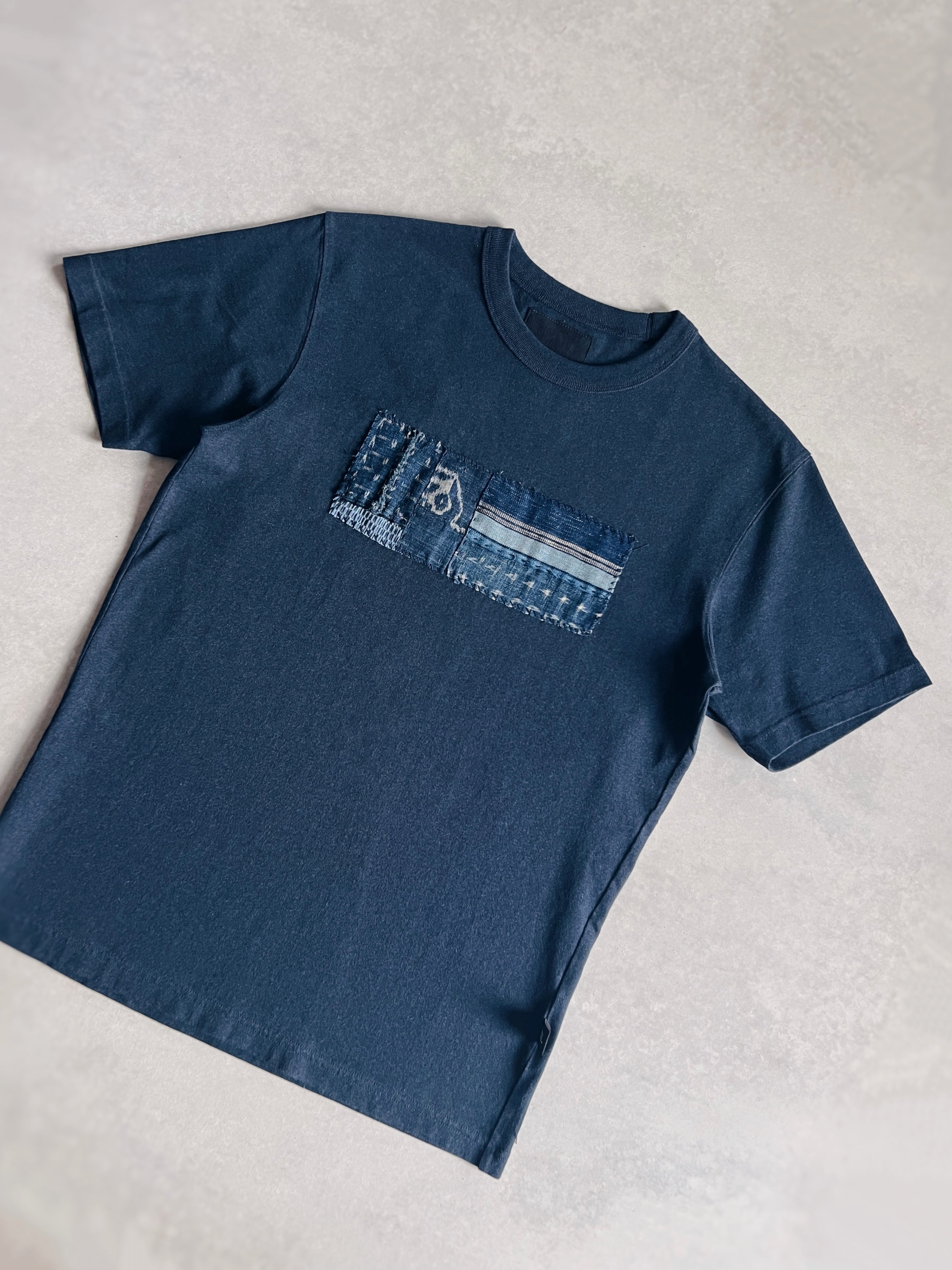 'm' for the maker : kinship tee - s