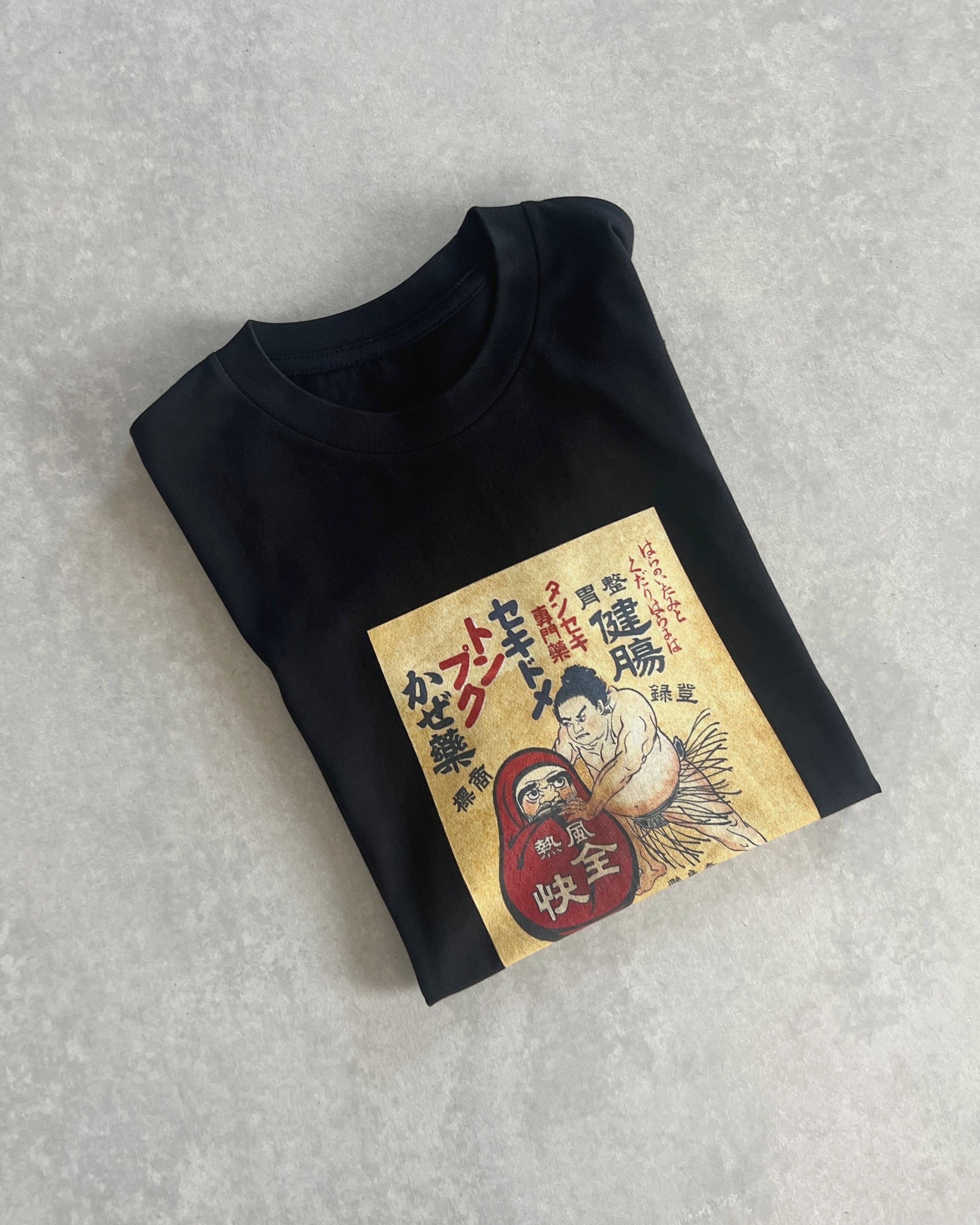 the maker tee : sumo vs daruma