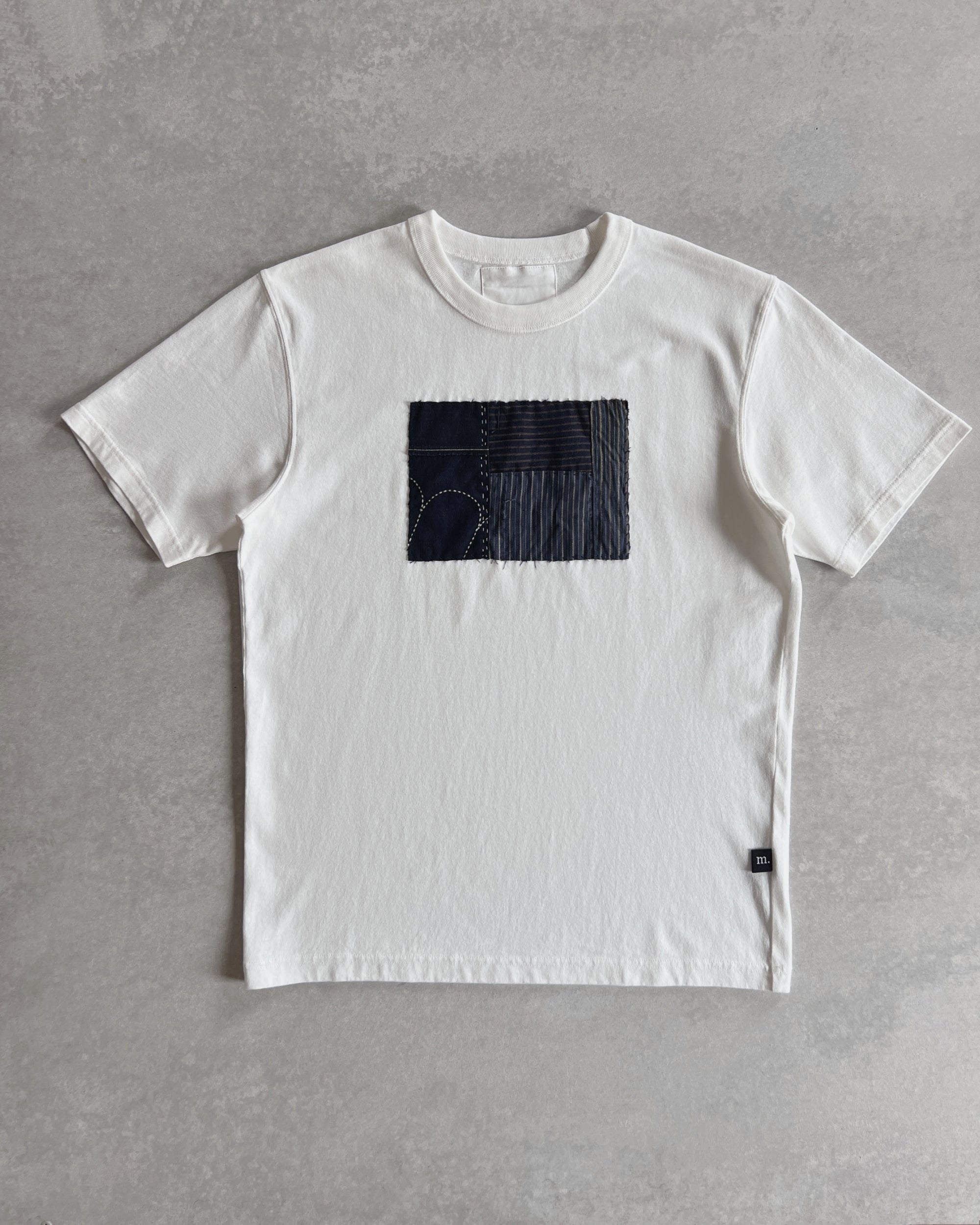 'm' for the maker : kinship tee - s