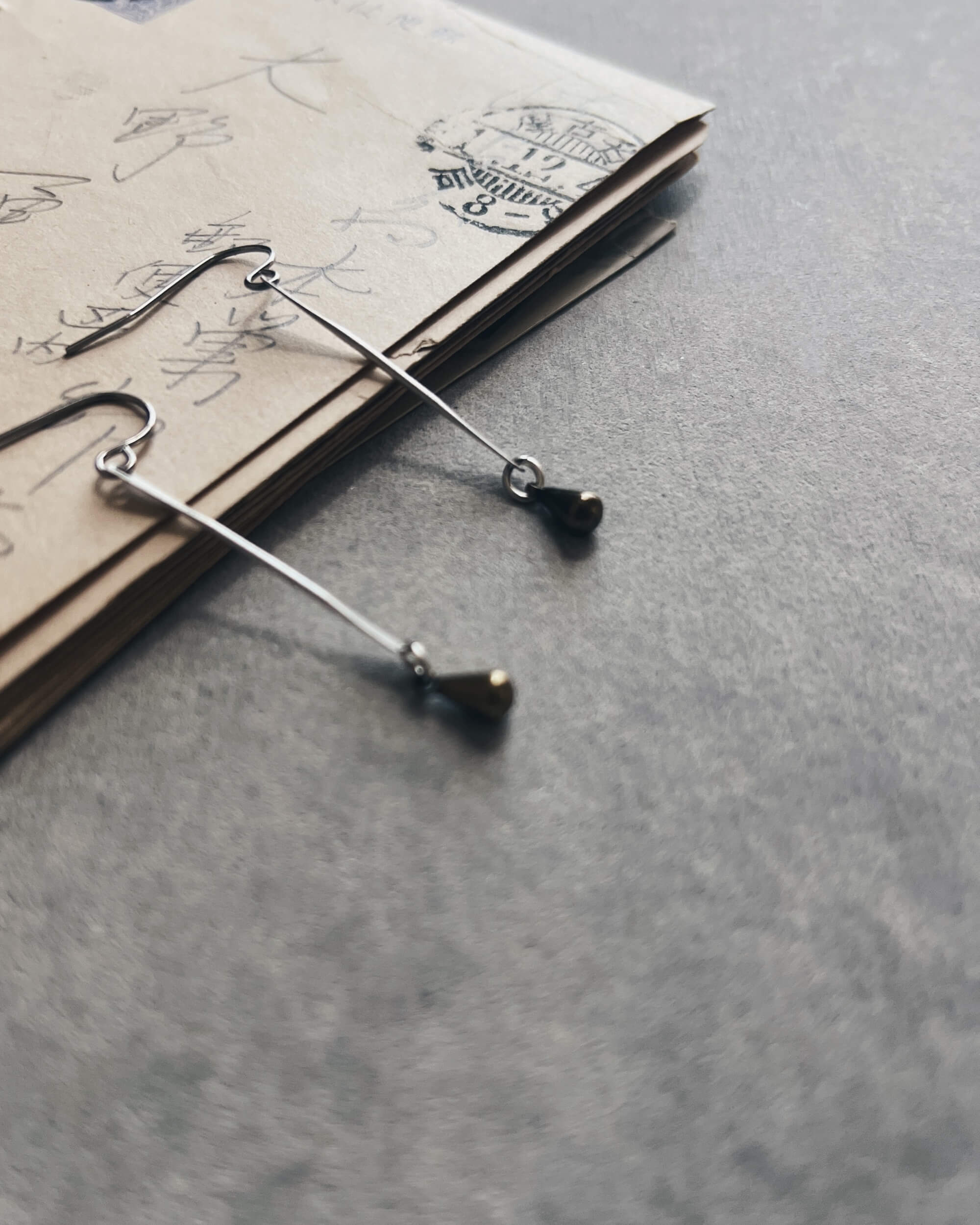 alchemy inc. : two tone droplet earrings
