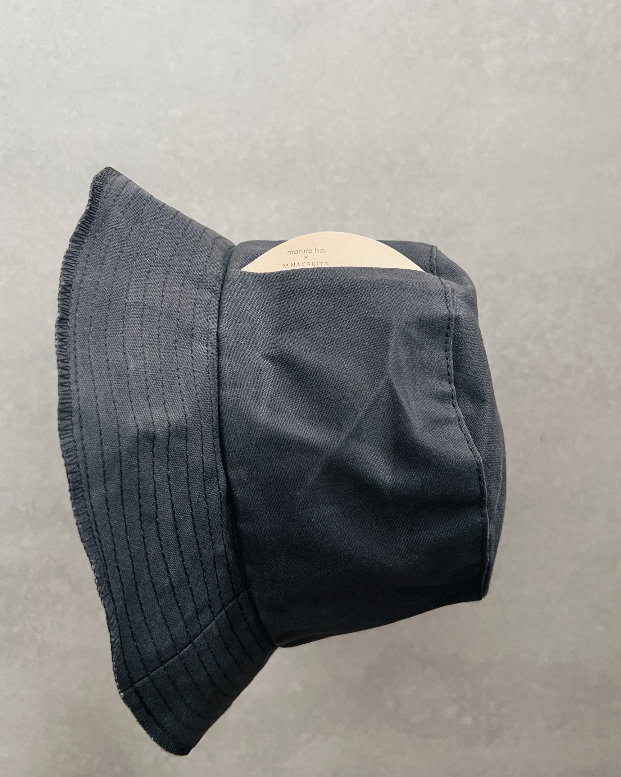 mature ha : paraffin hat in charcoal