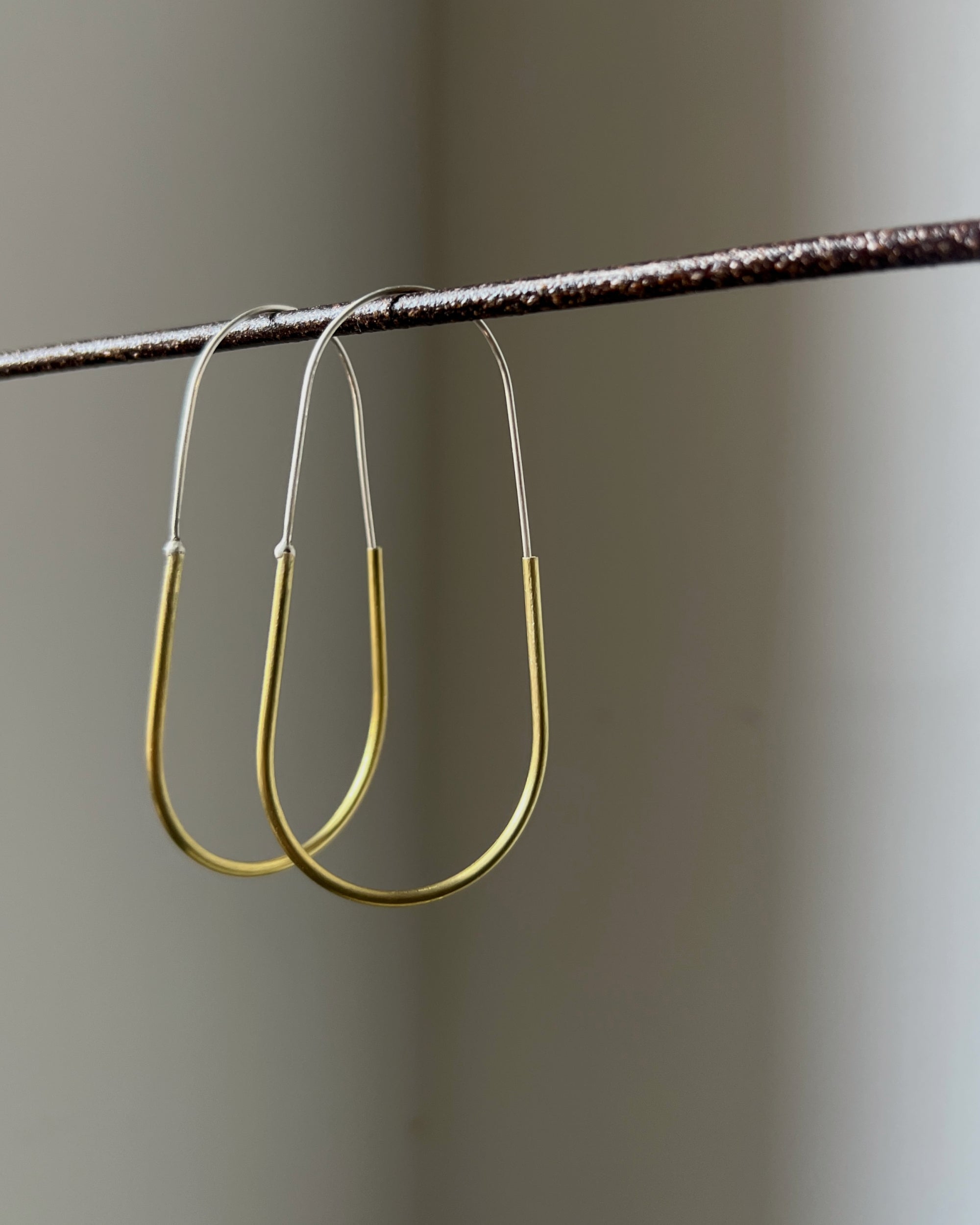 stacey vickery : hollow brass hoop and sterling silver earrings