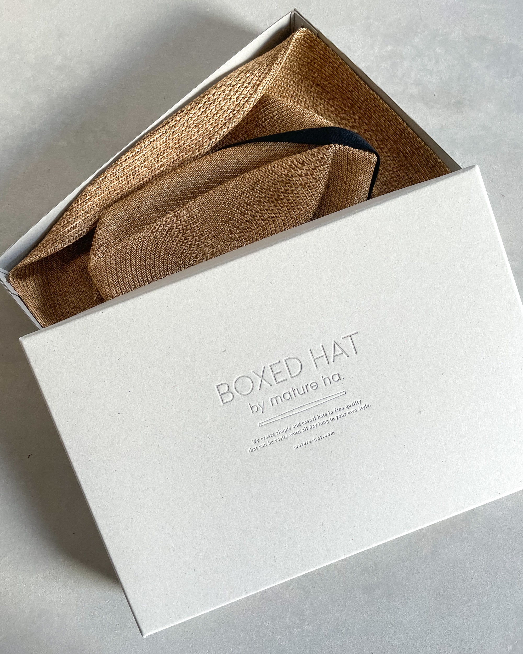 mature ha : boxed hat with carbon garden ribbon