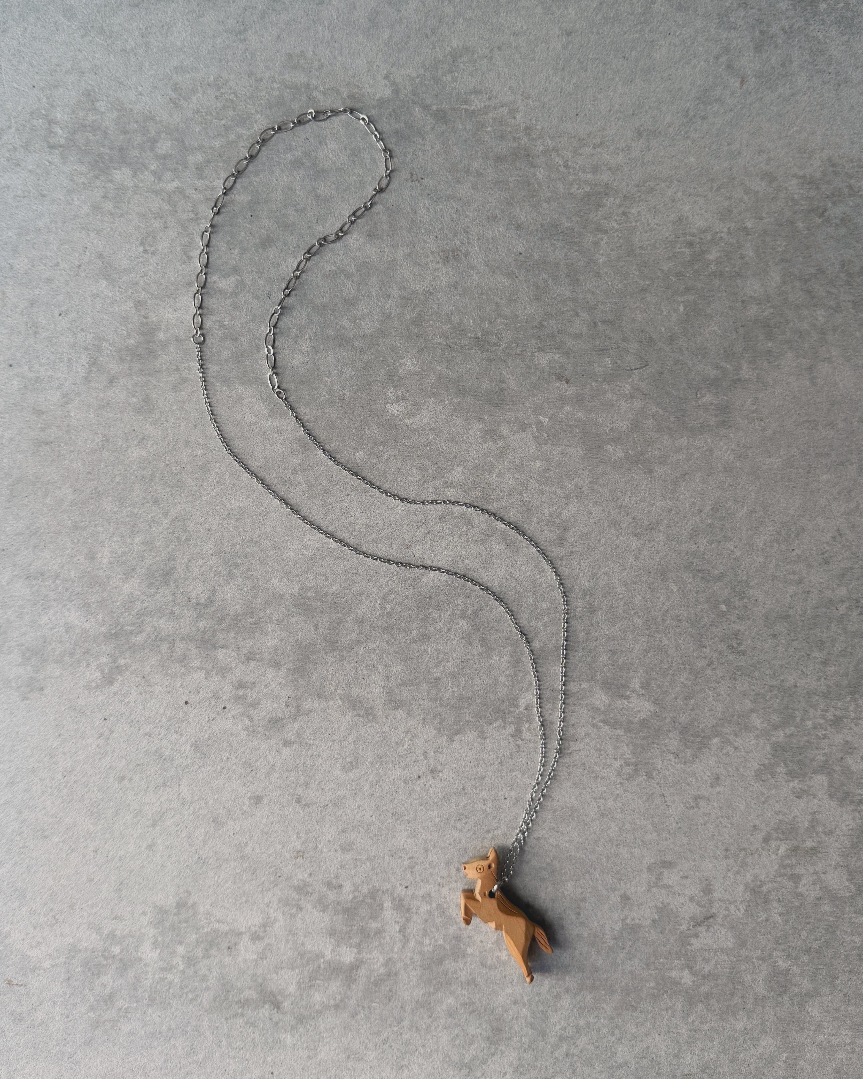 modern marcel : wooden horse pendant necklace