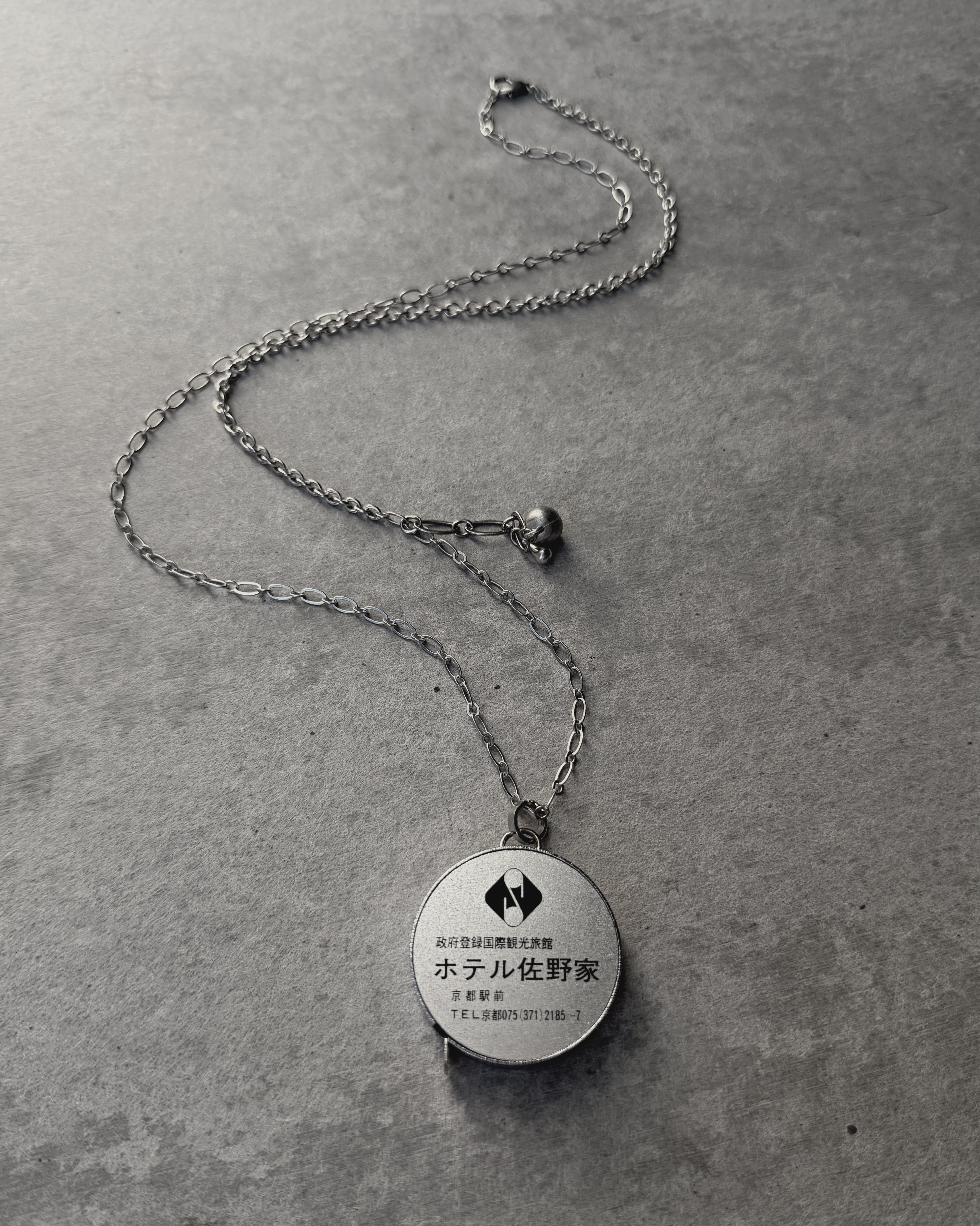 modern marcel : vintage Japanese measuring tape pendant necklace