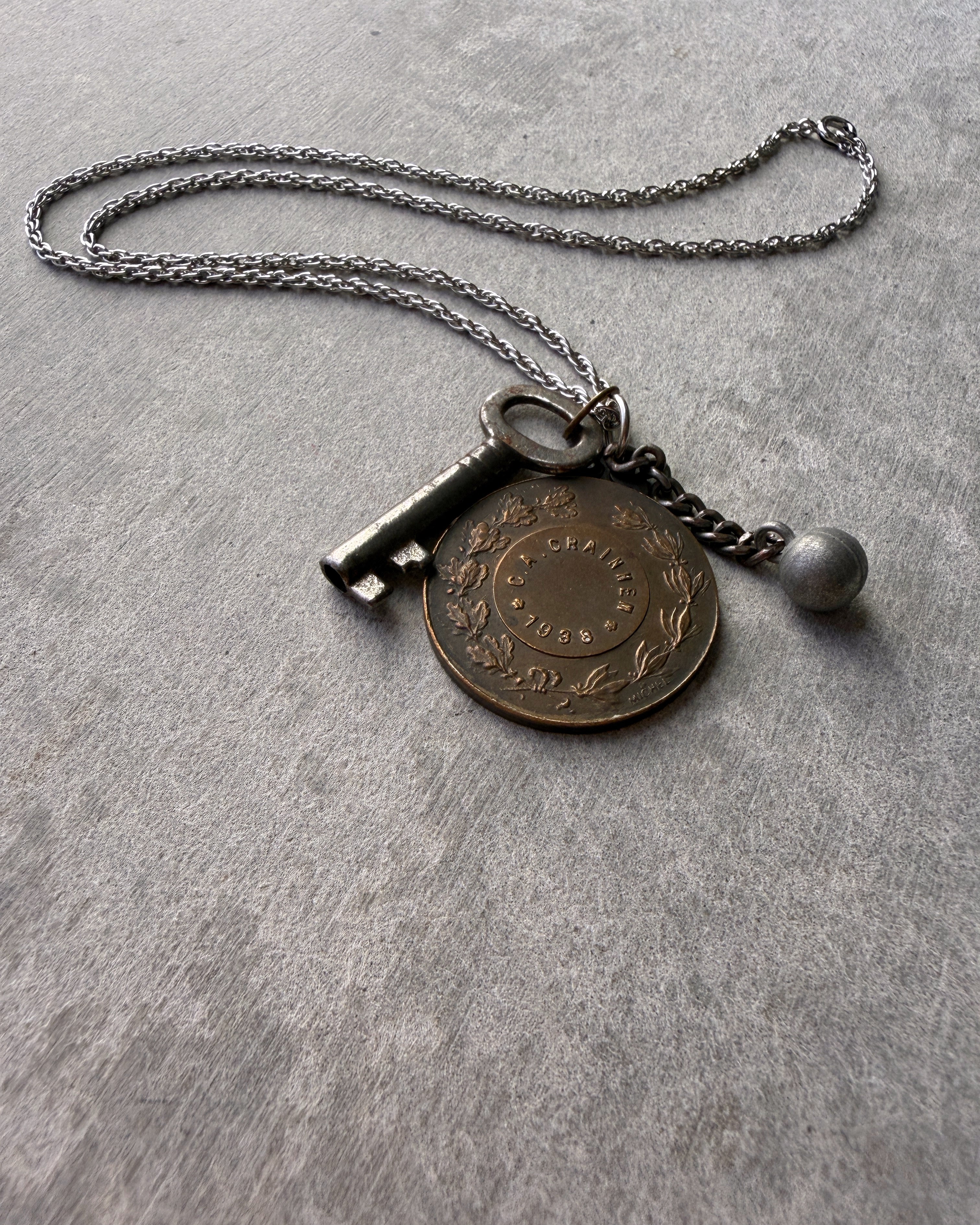 modern marcel : vintage athletics medallion pendant necklace