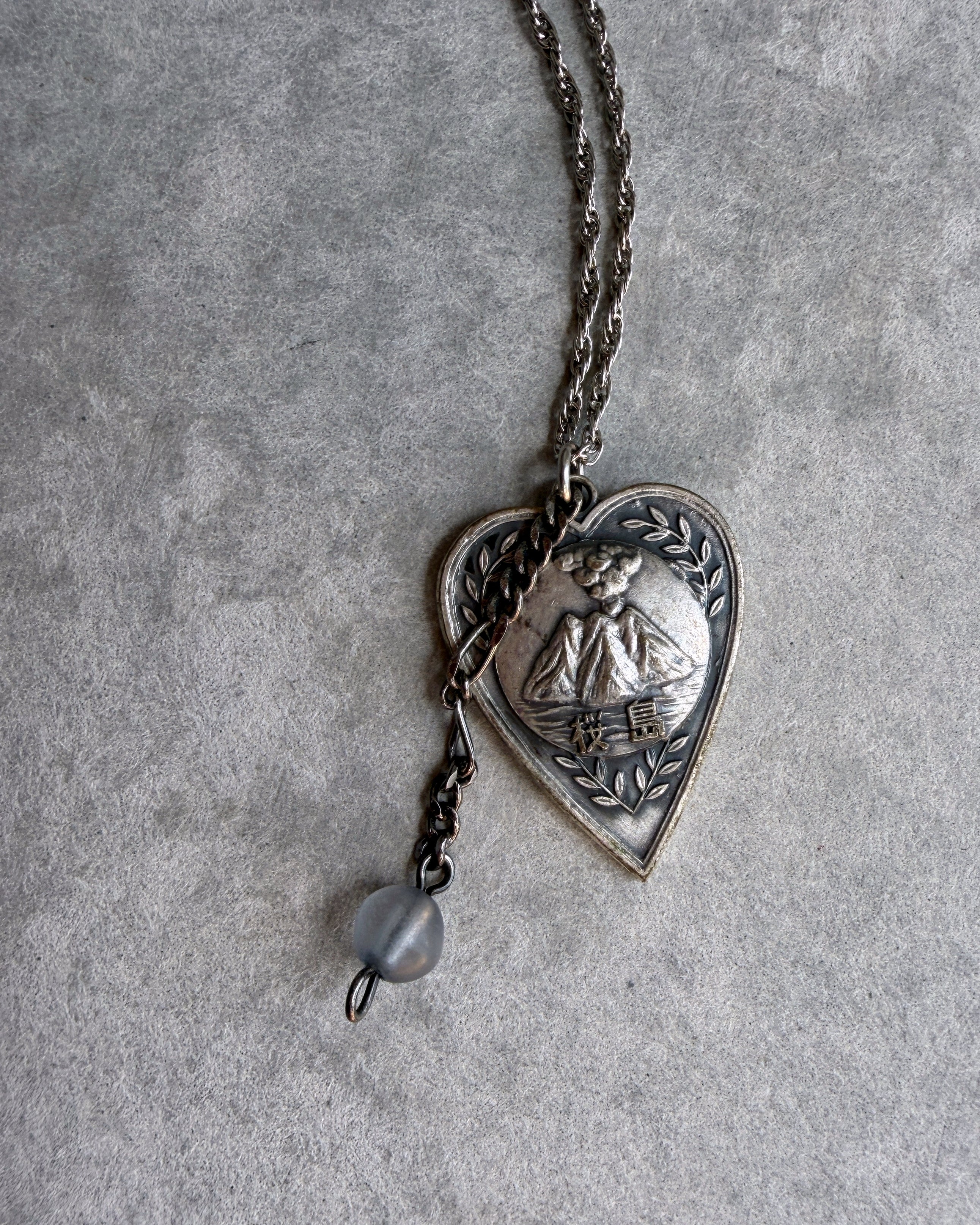 modern marcel : vintage Japanese volcano pendant necklace