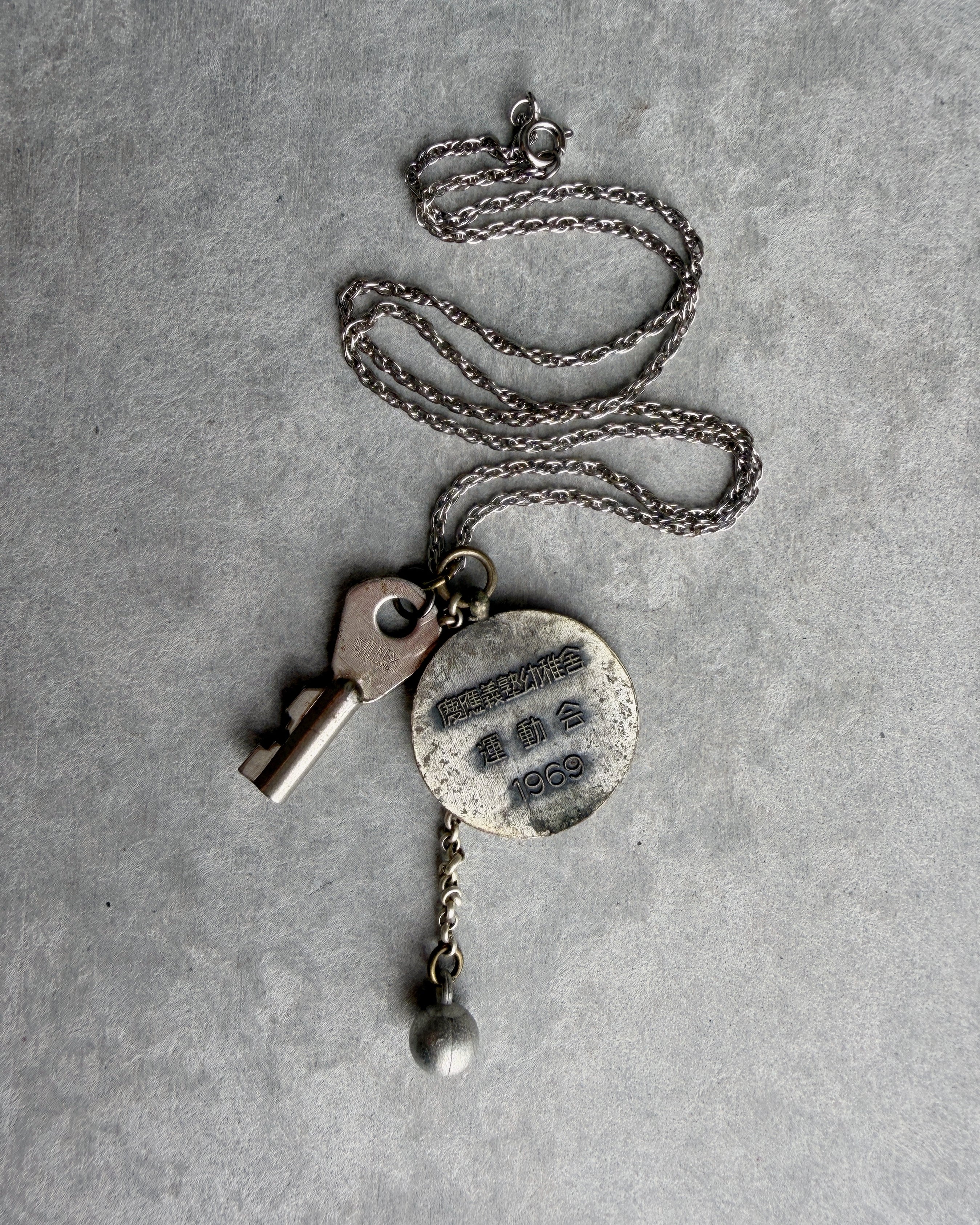 modern marcel : vintage Japanese sports medallion pendant necklace
