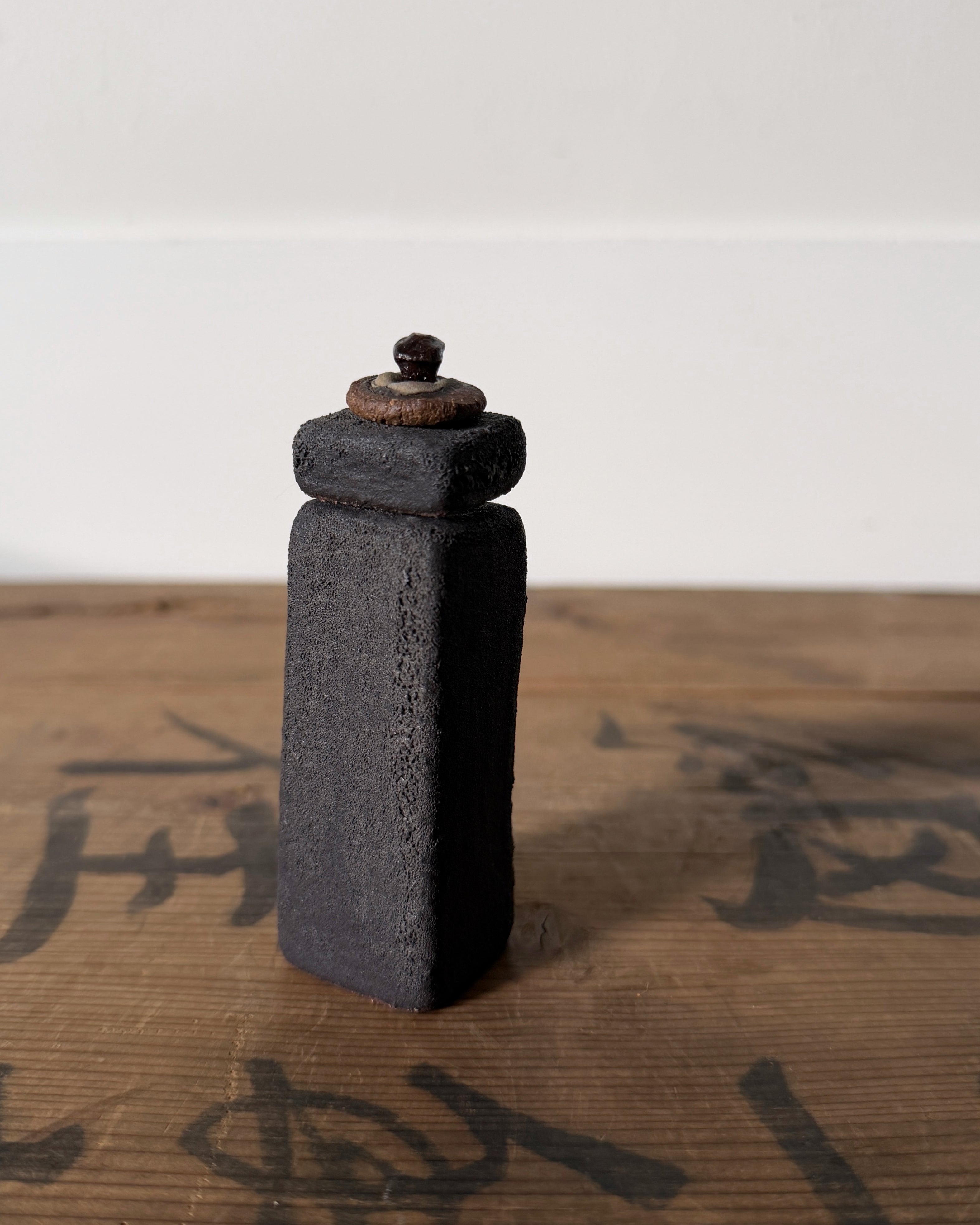 Scribed by Jo Reid-Speirs : lidded ceramic vase