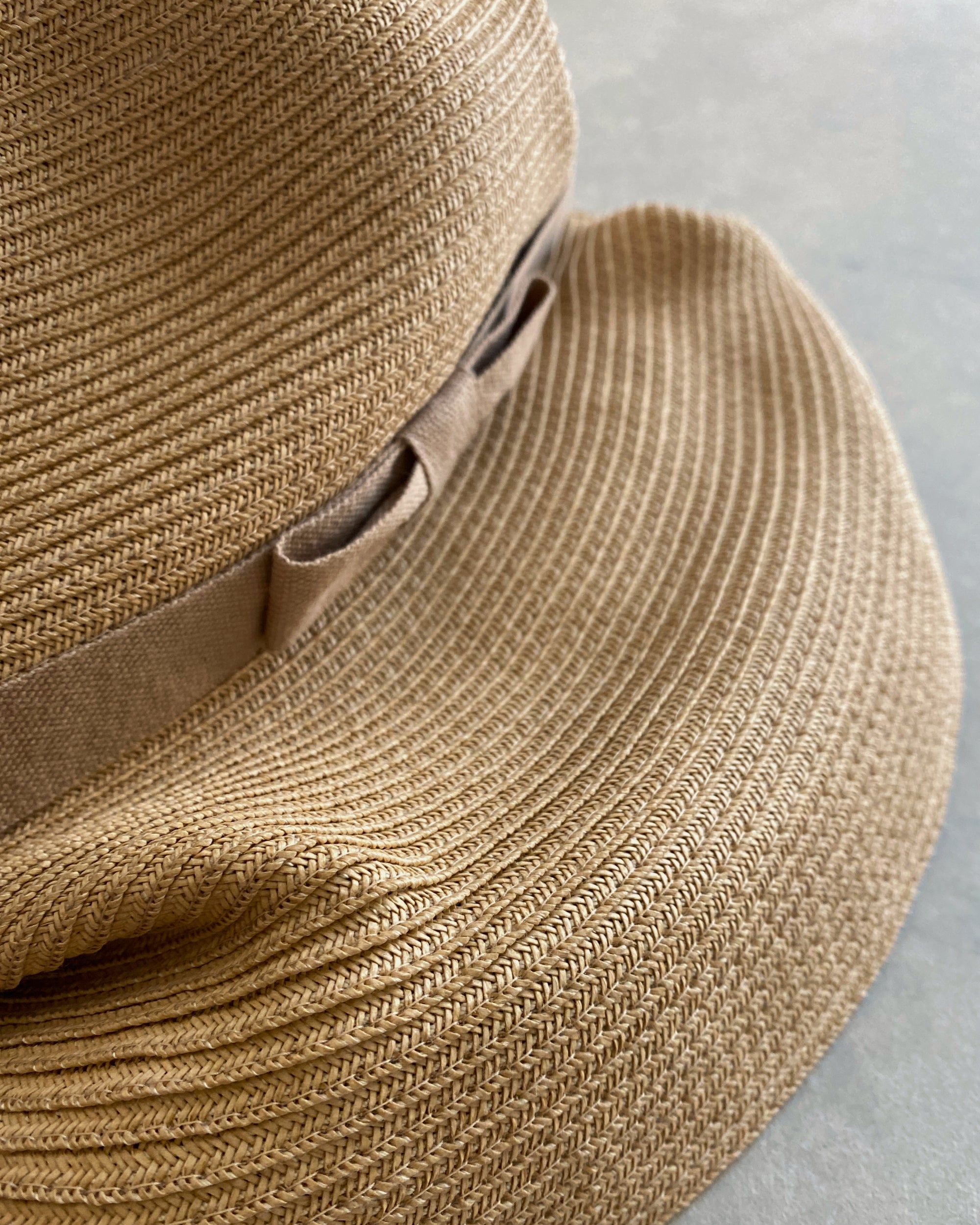 mature ha : boxed hat in sand with vanilla bean ribbon