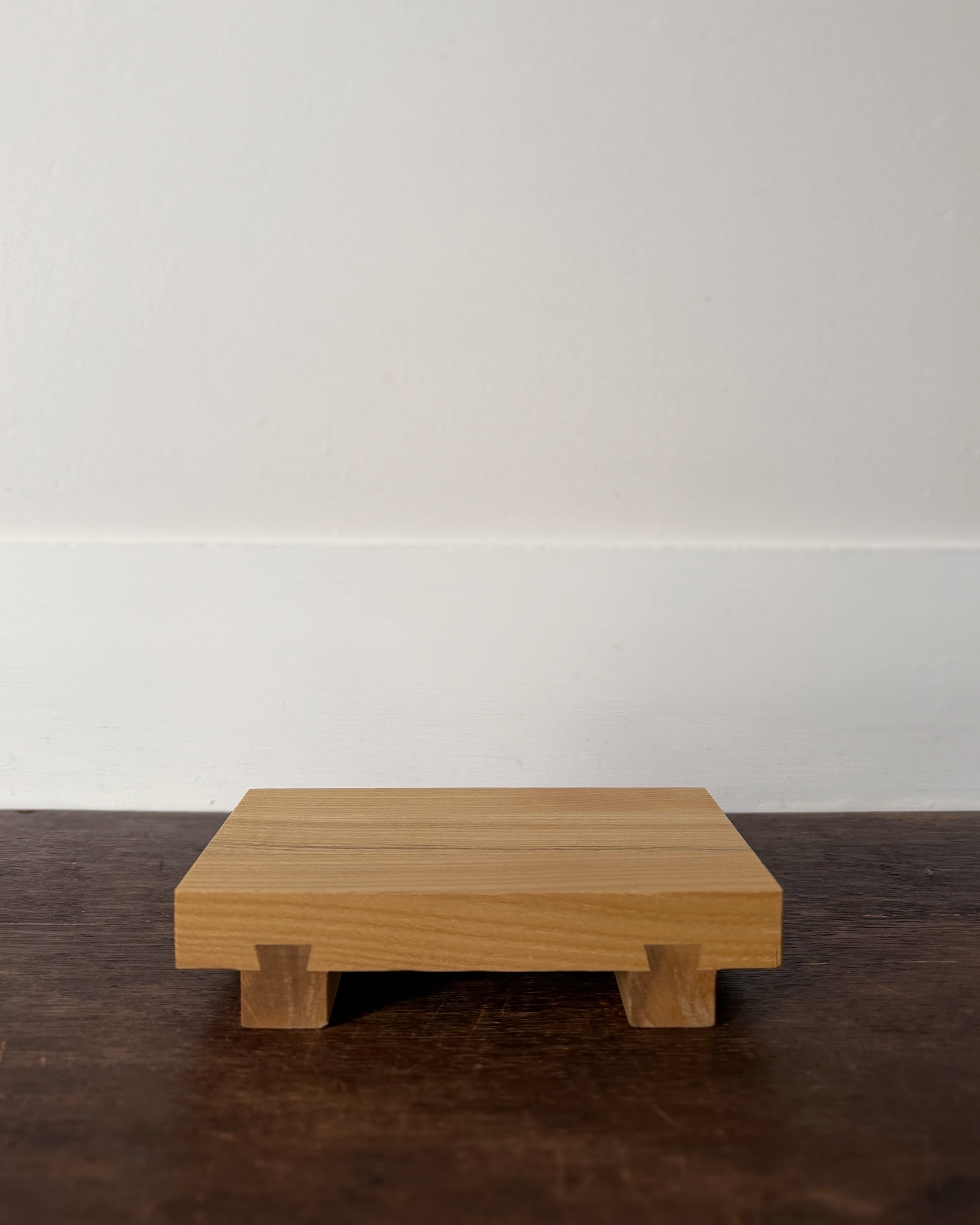 small wooden sushi serving stand