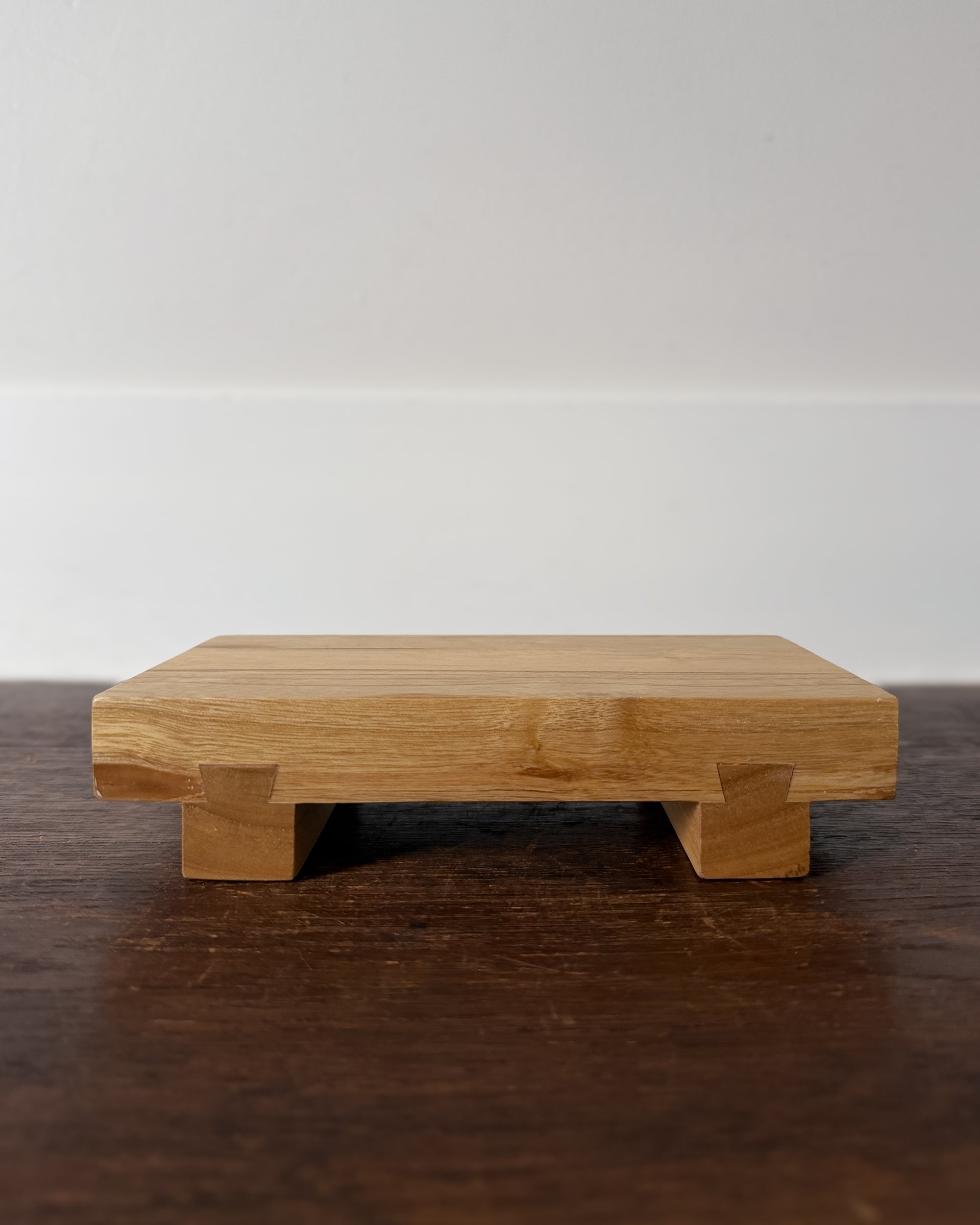 small wooden sushi serving stand