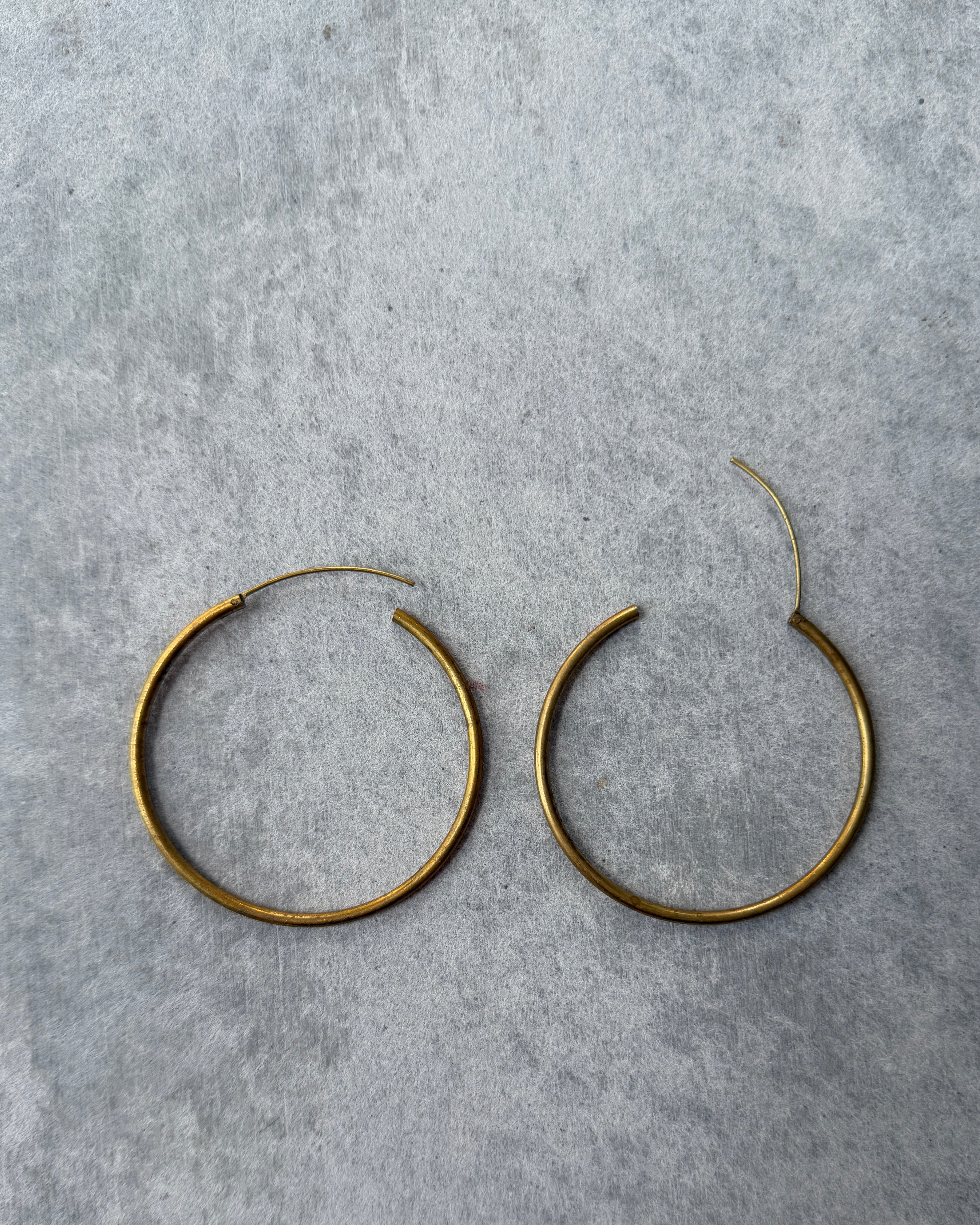 milk-toast : unflappable hoop earrings