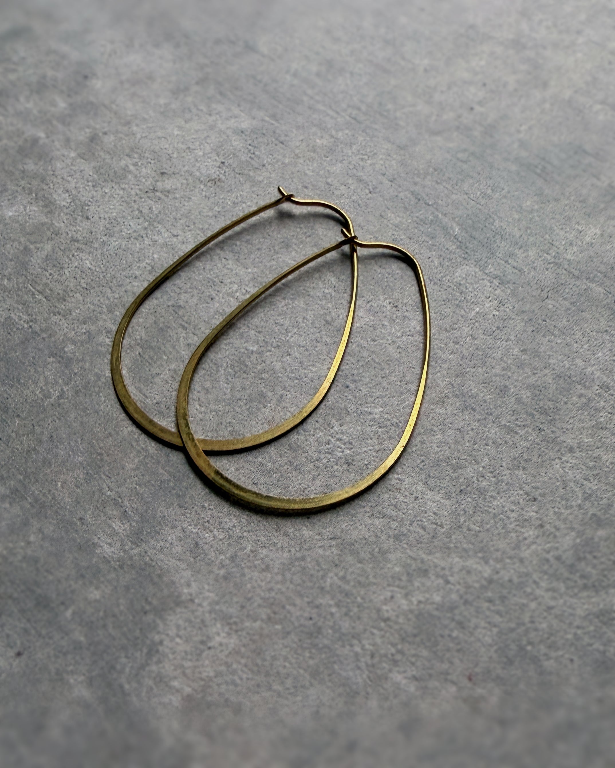 milk-toast : timid hoop earrings