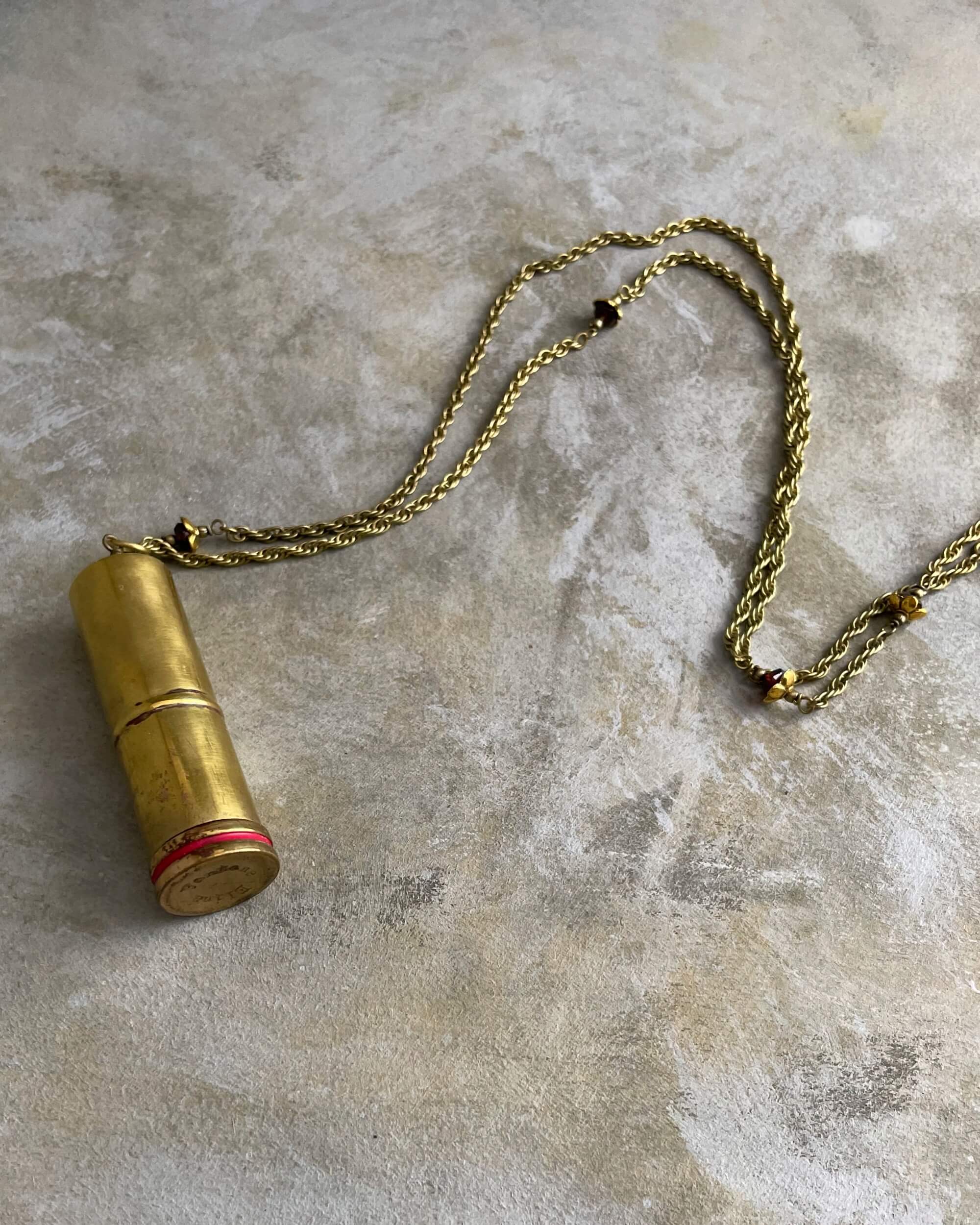 tabito : brass necklace with makeup brush pendant