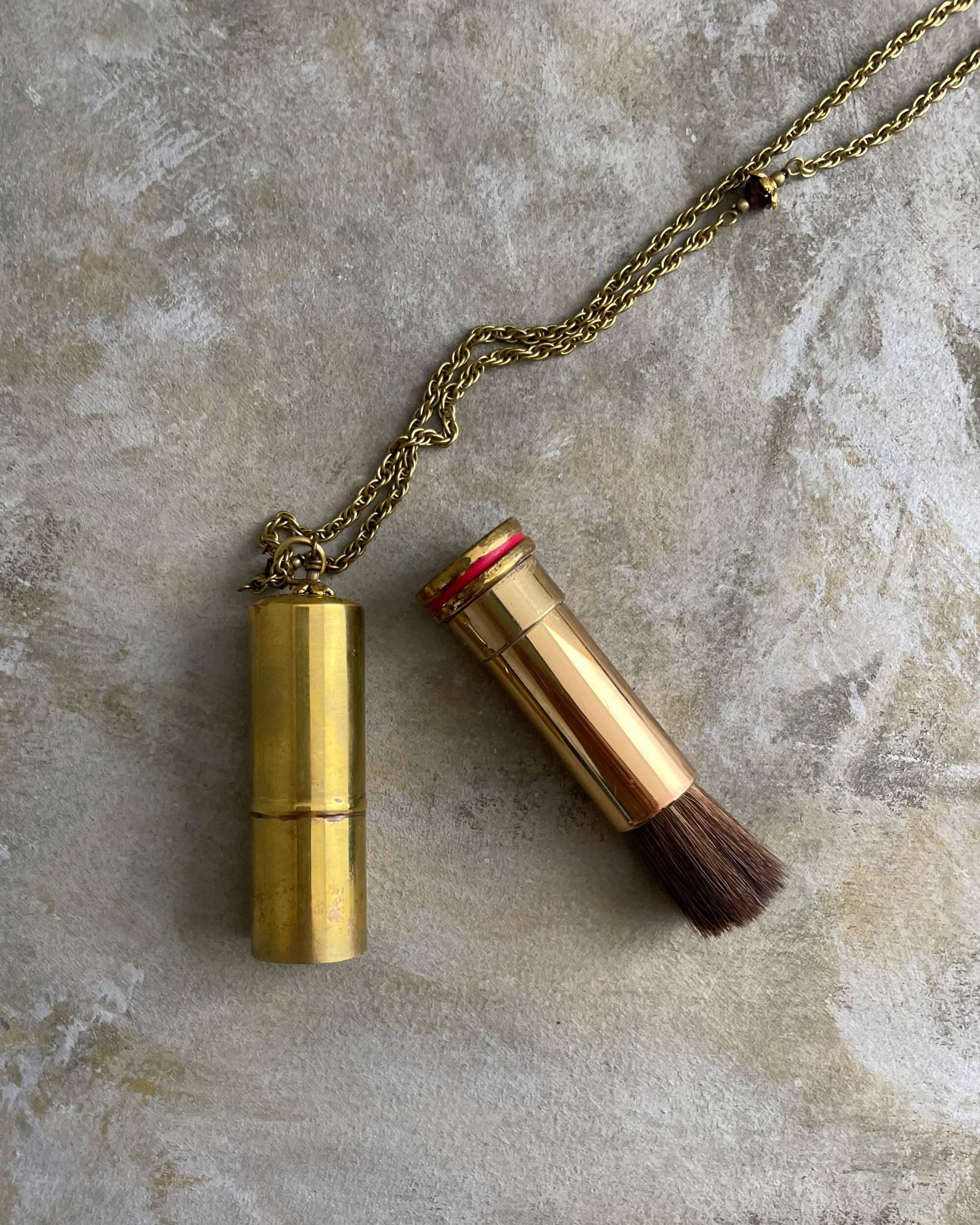 tabito : brass necklace with makeup brush pendant